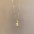 Minimalist gold necklace featuring a baroque irregular pearl pendant with gold metal edges - X1703 Gold - Baroque Pearl