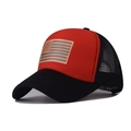 Detail of red and black trucker hat with American flag patch and breathable mesh back - Black and Red