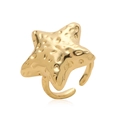 Anillo vintage de estrella de mar bañado en oro de 18K con textura martillada y diseño - Anillo Estrella Martillado Textura Dorada