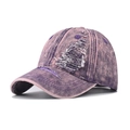 Close-up of purple washed denim baseball cap with distressed torn fabric and retro style - Adjustable / Denim Purple