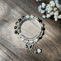 Elegant beaded bracelet with black and clear crystals featuring a butterfly charm and tassels - S024-rhinestone Butterfly Black Bracelet With Bursting Flowers And Diamonds #sz204