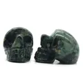 Natural dark green agate crystal skull carving 1-inch Halloween skull ornament - Rhyolite