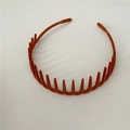 Toothed matte plastic headband in deep orange brick red color for secure styling - Orange