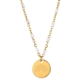 Detailed close-up of a gold stainless steel necklace with white beads and rainbow pendant - Rainbow