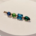 Close-up of golden hair clip with colorful square and drop-shaped crystal stones - Style F (Mixed Color Gems)