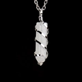 Detailed close-up of a hexagonal white quartz crystal pendant with silver spiral wire wrap - Silver & White Crystal
