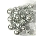 Macro detail of assorted silver mirror-finish decorative cake spheres in bulk packaging - 20pcs (4 Sizes) / Silver