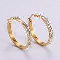 Detailed view of gold hoop earrings with double row inlaid rhinestones and pin closure - Gold