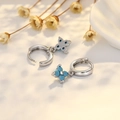 Boucles d'oreilles trèfle en argent avec zircons bleu clair et design floral élégant - Trèfle en Zirconia Bleu Turquoise / Or Blanc