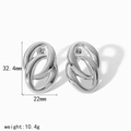 Detalle de pendientes de doble aro ovalado con medidas 32,4 mm x 22 mm y peso - Estilo ovalado retorcido plateado (TE6957-S)