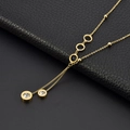 Collana in acciaio al titanio con numeri romani e pendenti a nappa in zircone - Oro (A710)