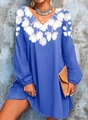 Close-up of V-neckline with white floral print on a blue long-sleeve casual dress - S / Dresses / Blue