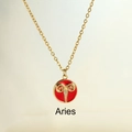 Titanium steel Aries zodiac necklace with red enamel pendant and gold-tone chain - Aries
