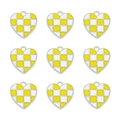 Nine heart-shaped yellow and white checkered enamel pendants on white background - Silver Tone Yellow White Checkerboard Heart
