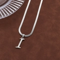 Sleek silver letter I pendant necklace with smooth snake chain on brown velvet - Letter I