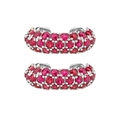 Macro shot of silver ear hoops featuring multi-row pave-set red ruby stones - Silver Ruby