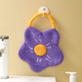 Plush purple flower-shaped coral velvet hand towel with a yellow center and hanging loop - Purple