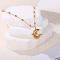 Collier en acier au titane plaqué or avec pendentif dauphin et chaîne perlée raffinée - Style Océan-Pendentif Dauphin