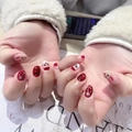 Short round press-on nails with red Christmas deer and snowflake festive patterns - Jelly Glue Type