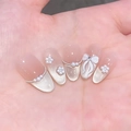 Unghie finte sfumate rosa cat-eye con fiocchi 3D e catene di perle a mandorla - M / Verso Celeste (BY1781)