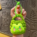 Handmade green knitted frog pouch for Bluetooth earphones with decorative bead charm - Frog Knitted Coin Purse