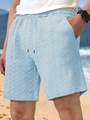Detailed shot of light blue men's shorts showing textured herringbone fabric and drawstring - Light Blue
