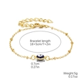 Bohemian gold chain bracelet featuring a blue evil eye bead and adjustable clasp - Black (Single Eye)