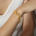 18k gold plated vintage circular geometric link bracelet shown on a female wrist - Bracelet / 15+5cm / Gold