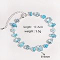 Bracelet élégant avec zircons bleus cubiques irréguliers et chaîne de réglage en argent - Zircon Aigue-Marine Argent