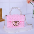 Pink heart-shaped fidget silicone crossbody bag with faux pearl handle and gold chain - Pink