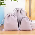 Three premium grey-purple velvet drawstring pouches in various sizes for jewelry storage - Silver Gray