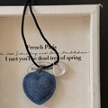 Blue denim heart necklace with a silver metal tag on a black braided leather cord - Blue Heart Bag Necklace
