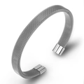 Detailed macro of silver milanese mesh stainless steel cuff bracelet with polished ends - Milanese Cylindrical Cap / Silver