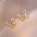Elegant gold butterfly stud earrings with sparkling cubic zirconia on satin fabric - Full Diamond Agile Butterfly Style (E0656) / Gold