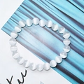 Minimalist 8mm white cat-eye stone bracelet featuring glossy gradient glass beads - White Cat's Eye