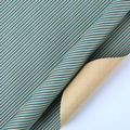 Blue plaid kraft wrapping paper with integrated cutting grid lines on the back - Light Blue Diagonal Stripes