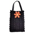 Detail of black popcorn fabric tote bag featuring a vibrant orange 3D sun flower decor - Black Bubble Fabric-Orange Large 6-Petal Flower