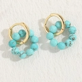 Elegantes pendientes chapados en oro de 14K con vibrantes cuentas de turquesa - Estilo Turquesa Azul
