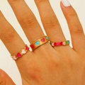 Three-piece gold heart rings set with colorful enamel drip oil designs on fingers - Multicolor Enamel Set of 2