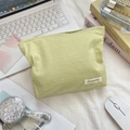 Floral makeup bag in light green jacquard fabric with chic dot texture and woven label - Pastoral Green Polka Dot