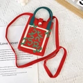 Mini knit phone bag in red with green handles and crossbody strap featuring woven patterns - Mahjong Fortune Red