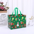 Green Christmas non-woven gift bag with festive snowman and gift patterns - 32*25*17cm / Christmas Green