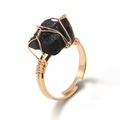 Handmade wire wrapped ring featuring raw black gemstone and adjustable gold band - Obsidian