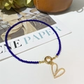Deep blue beaded necklace with a golden heart pendant and sparkling crystals - Blue Cut Bead Zircon Heart Pendant