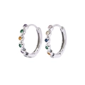 Macro detail of silver hoop earrings set with vibrant multi-colored gemstones - 12mm / Silver