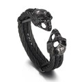 Pulsera gótica para hombre de cuero trenzado negro y cable de acero con calaveras - Negro