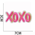 Detailed view of XOXO embroidery patch with pink and gold thread and size markings - No.3-XOXO Lettering