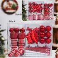 Set di decorazioni natalizie rosse e bianche con palline, stelle e calze in confezione - Rosso