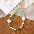 Creative crystal beaded phone strap with green cubes and white hearts on wooden surface - Crystal Heart Beaded Pendant / Green