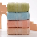 Set of four pastel cotton towels in green blue pink and apricot with stripe texture - Blue Grid Towel